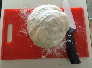 After the dough's mixed, it's ready to cut into two pieces, to make the floor and roof of the pie.