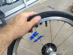 At last, it's back in and the tire is seated on the rim.