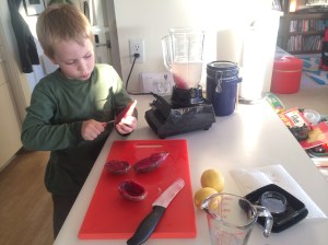 Kieran enjoyed scooping out the guts of the fruit.