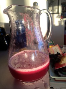 We strained the liquid to remove the seeds.